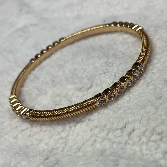 Graziano Gold Tone White Rhinestone Ribbed Bangle Bracelet - Picture 2 of 8